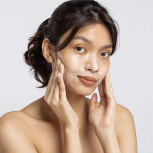 Model using Glycolic Age Diffusing Cleanser