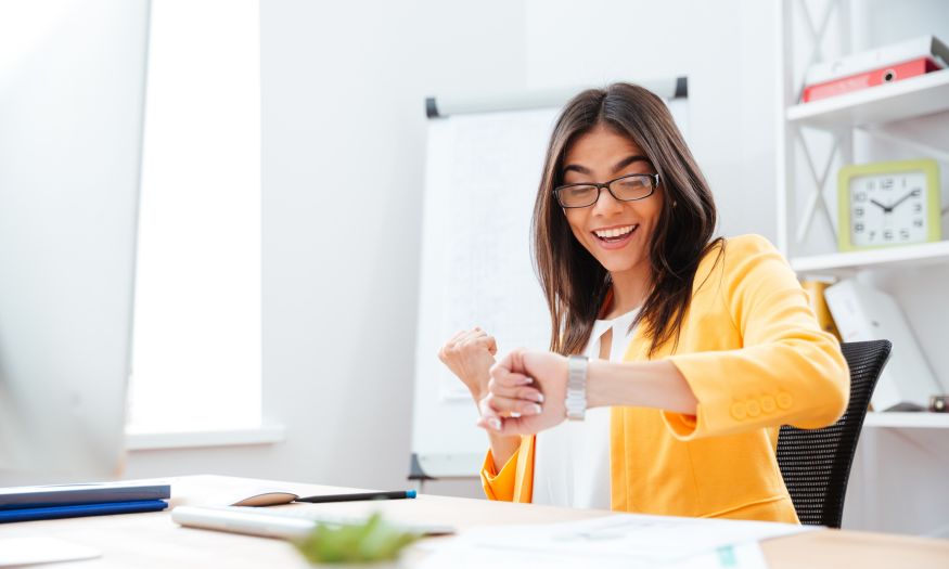 A happy woman who arrived on time at work