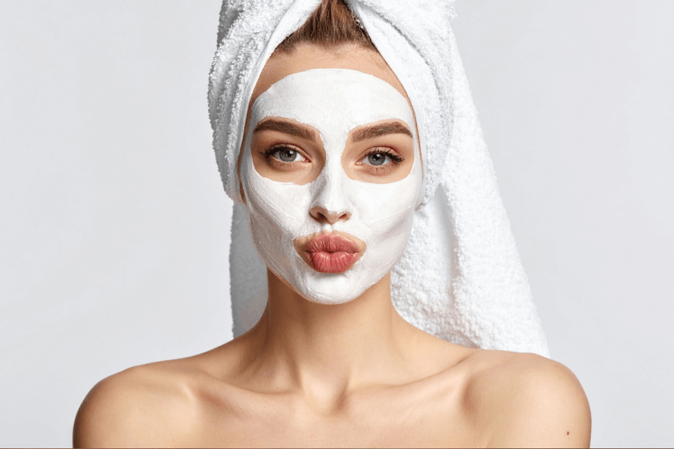 A woman having M.A.D Skincare Youth Transformation Glycolic Mask on her face